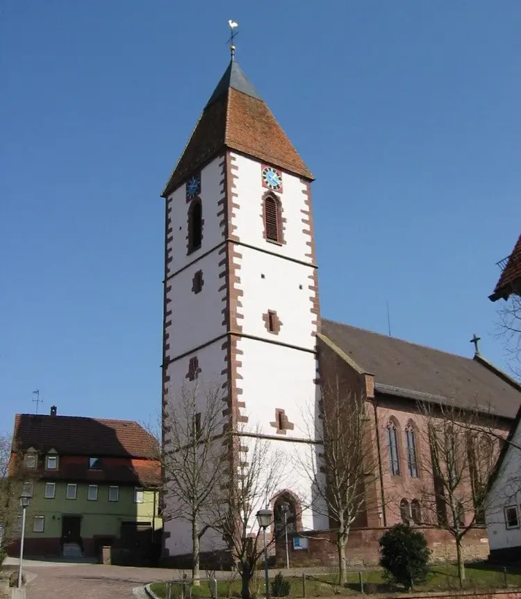 Die Kircher von Ebhausen besteht aus zwei Bauwerken: Das neugotische Kirchenschiff ist 1860 bis 1862 entstanden. Der um 1350 ursprünglich als Wehrturm entstandene Kirchturm stammt von der Vor-Vorgängerkirche und ist heute das älteste Bauwerk im Dorf.